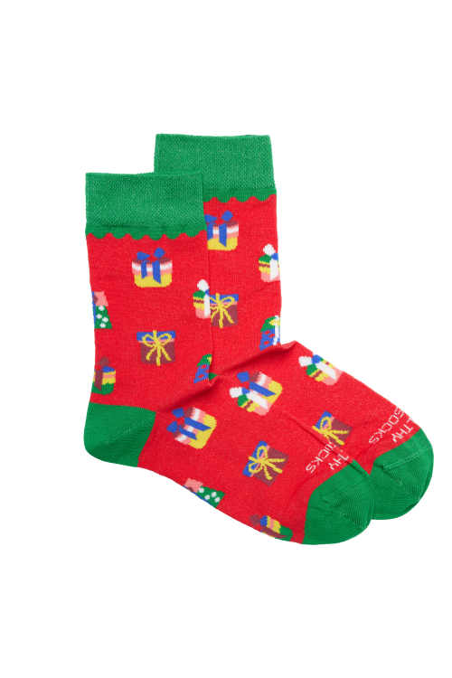 kies witte sokken met prints afbeelding onder de kerstboom. je echte bestelling staat klaar en meld filter bij klantenservice shop vakantiestemming